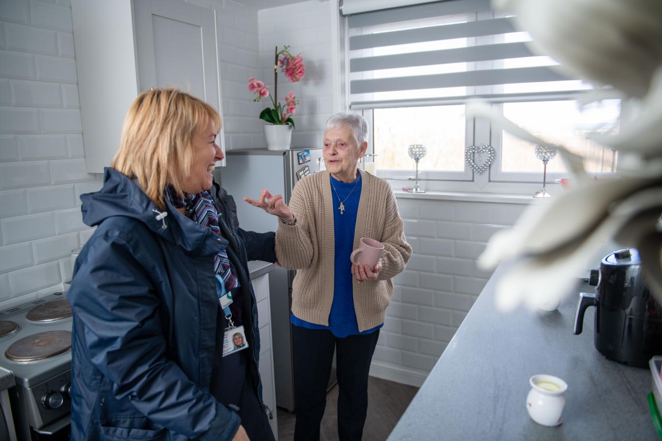 Housing Manager and Sanctuary Scotland resident in her refurbished kitchen